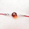 Modisches Armband aus roter Kordel mit Bernsteinperle und 925er Ag-Silber
