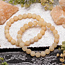 Armband aus orangefarbenen Kalzitperlen, 8 mm