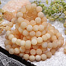 Armband aus orangefarbenen Kalzitperlen, 8 mm