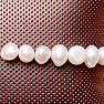 Chakra-Armband aus weißen Perlen