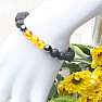 Armband aus bernsteinfarbenem Polyresin und Lavastein mit Shamballa-Verschluss