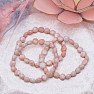 Armband aus rosa Opalperlen im Schliff, 8 mm