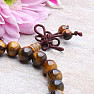 Tiger Eye Buddha hatte ein Chakra-Armband